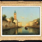 Gondolier on a Venetian canal thumbnail