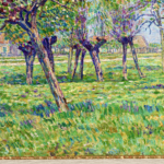 Blühende Apfelbäume auf einer sonnigen wiese thumbnail