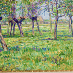 Blühende Apfelbäume auf einer sonnigen wiese thumbnail